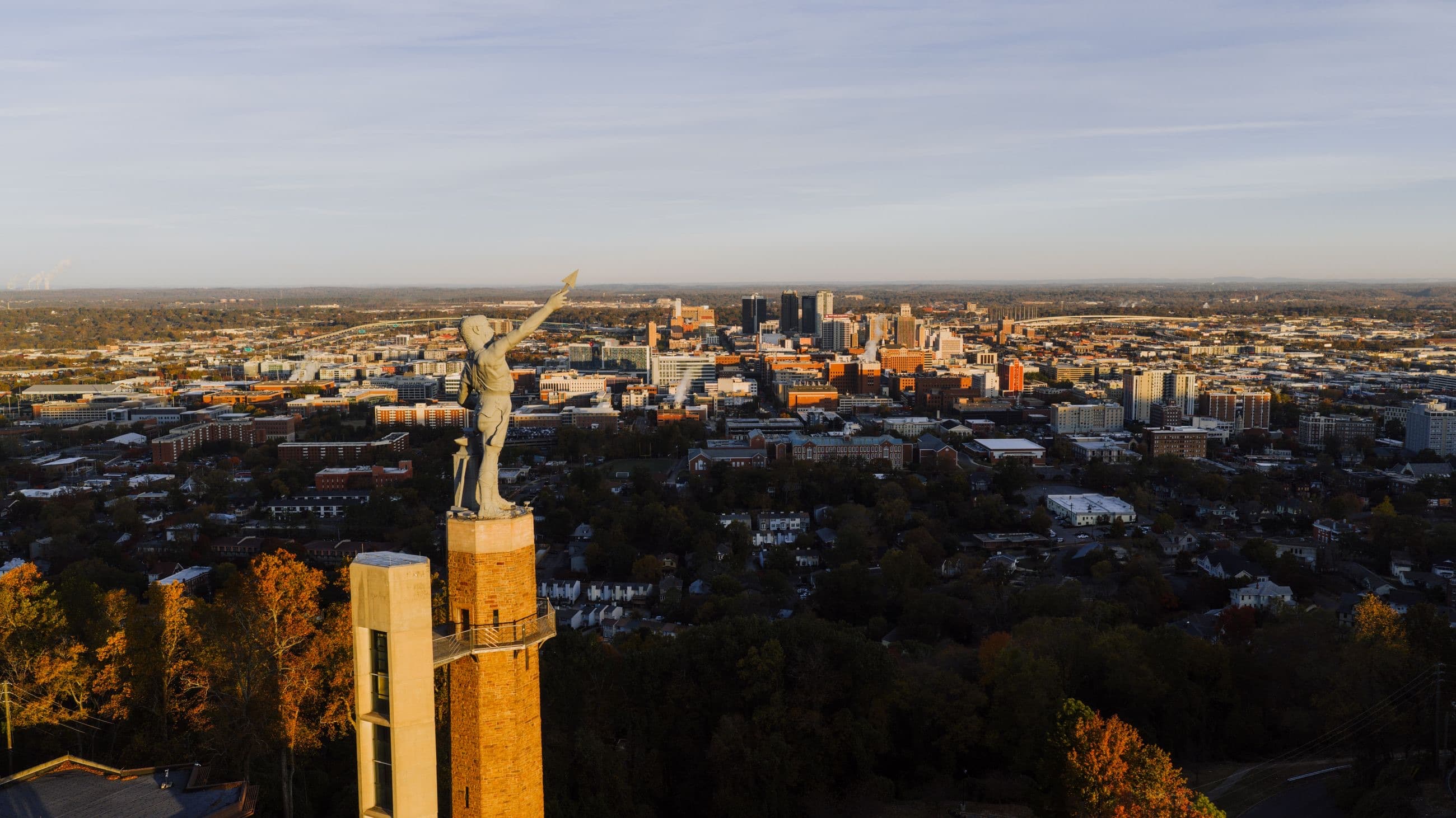 The Vulcan statue overlooking downtown Birmingham, Alabama at golden hour